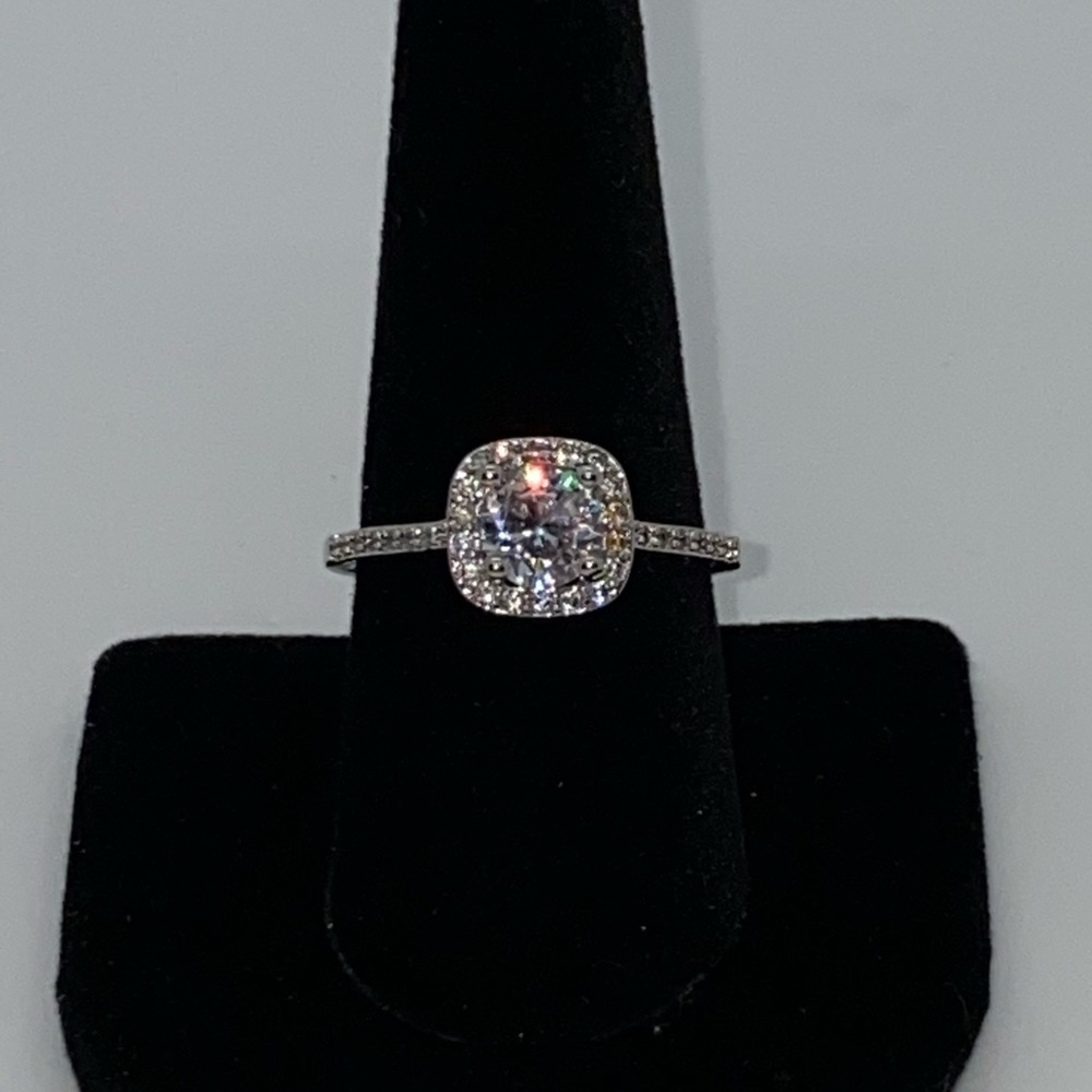 Cocktail ring with simulated center diamond & halo